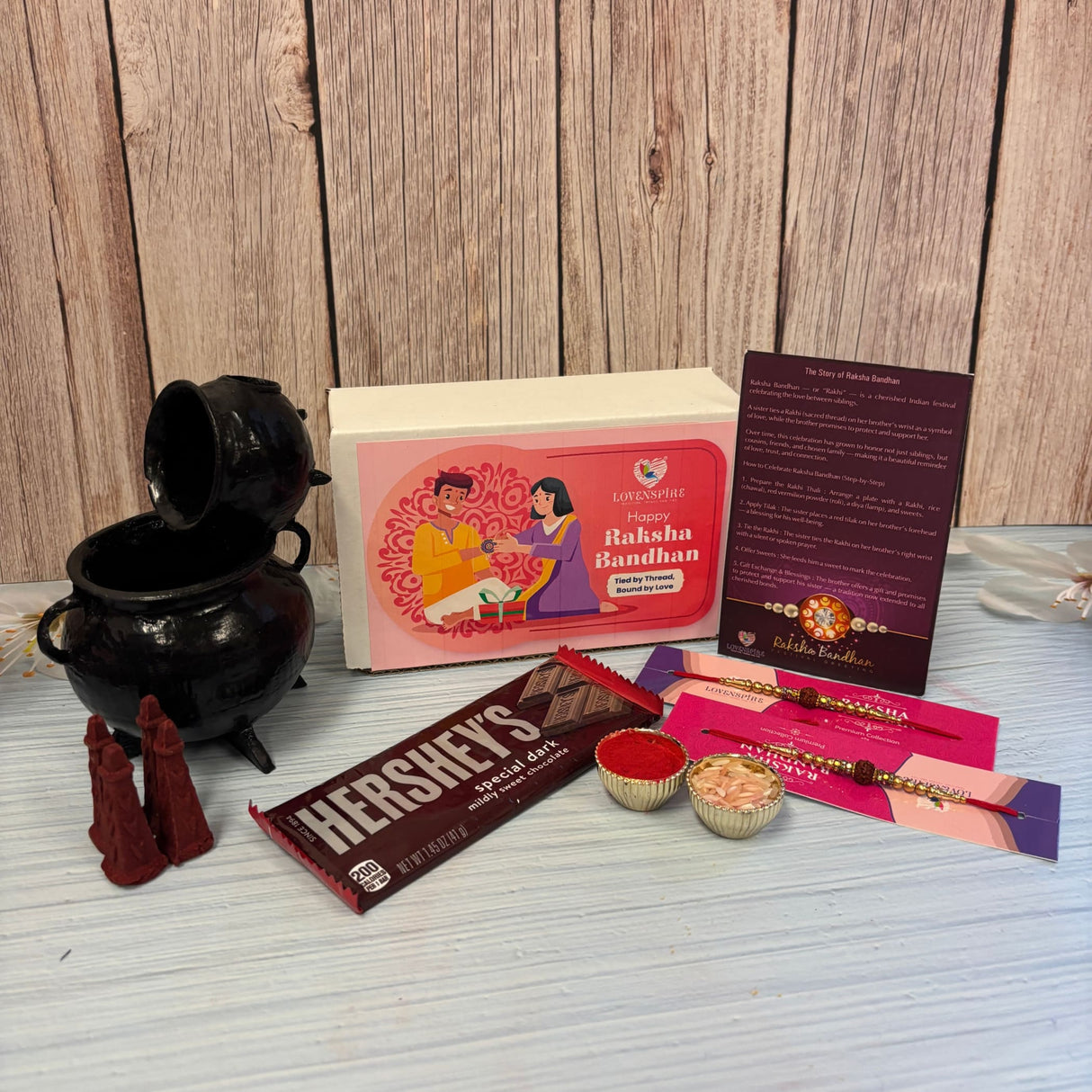 Raksha Bandhan Gift Hamper for Brother & Bhabhi – Includes 2 Rudraksha Rakhi Bracelets, Dhoop Burner, Dhoop Sticks, Chocolates, Roli Chawal & Gift Box