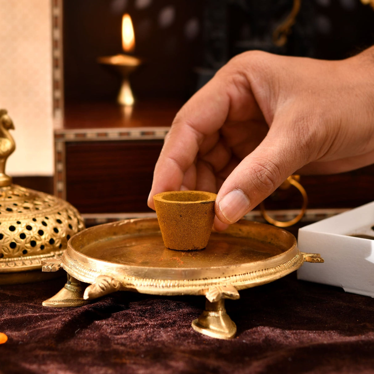 Golden brass incense burner with ornate three-legged feet for Sandalwood Dhoop Cups