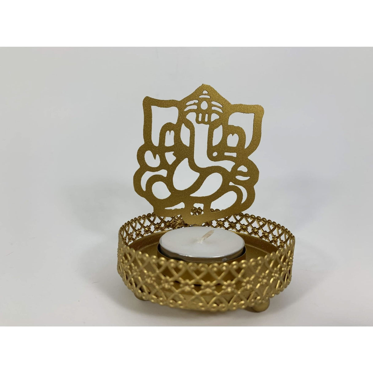 Golden Ganesha-shaped tea light holder with intricate cutouts for Diwali and Navaratri celebrations