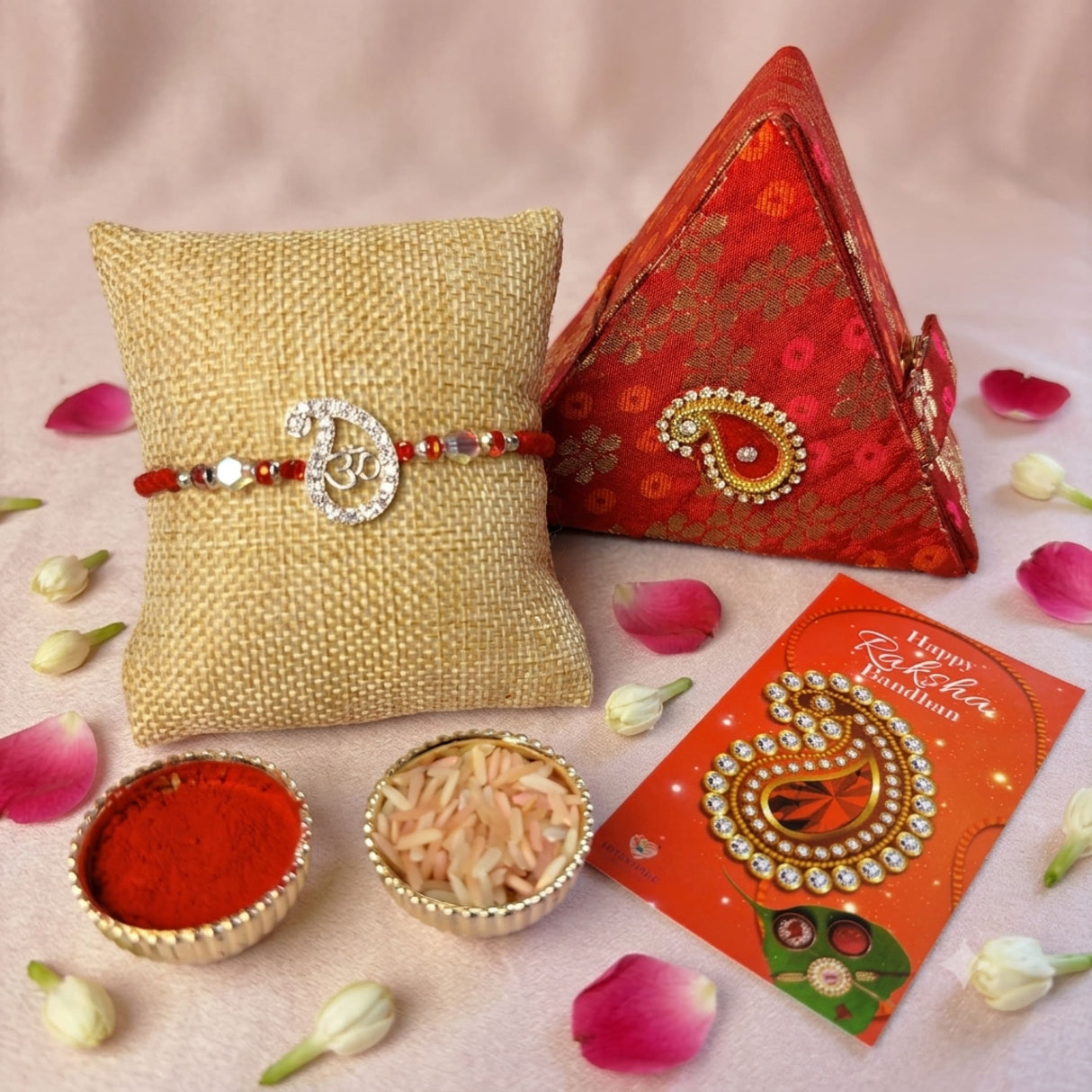 Designer pure silver and red om rakhi with diamond-encrusted om design and beads for raksha bandhan protection