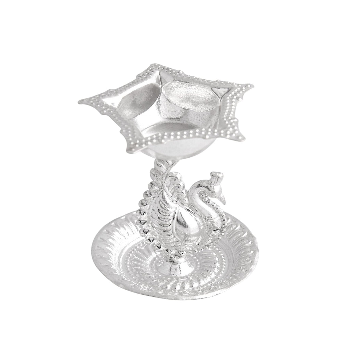 Silver plated peacock diya with ornate beaded edges and reflective metallic finish for home pooja mandir and Diwali decor