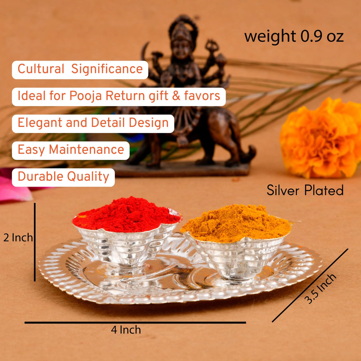 Silver-plated pooja plate with red and yellow powders for Indian festival and temple decor