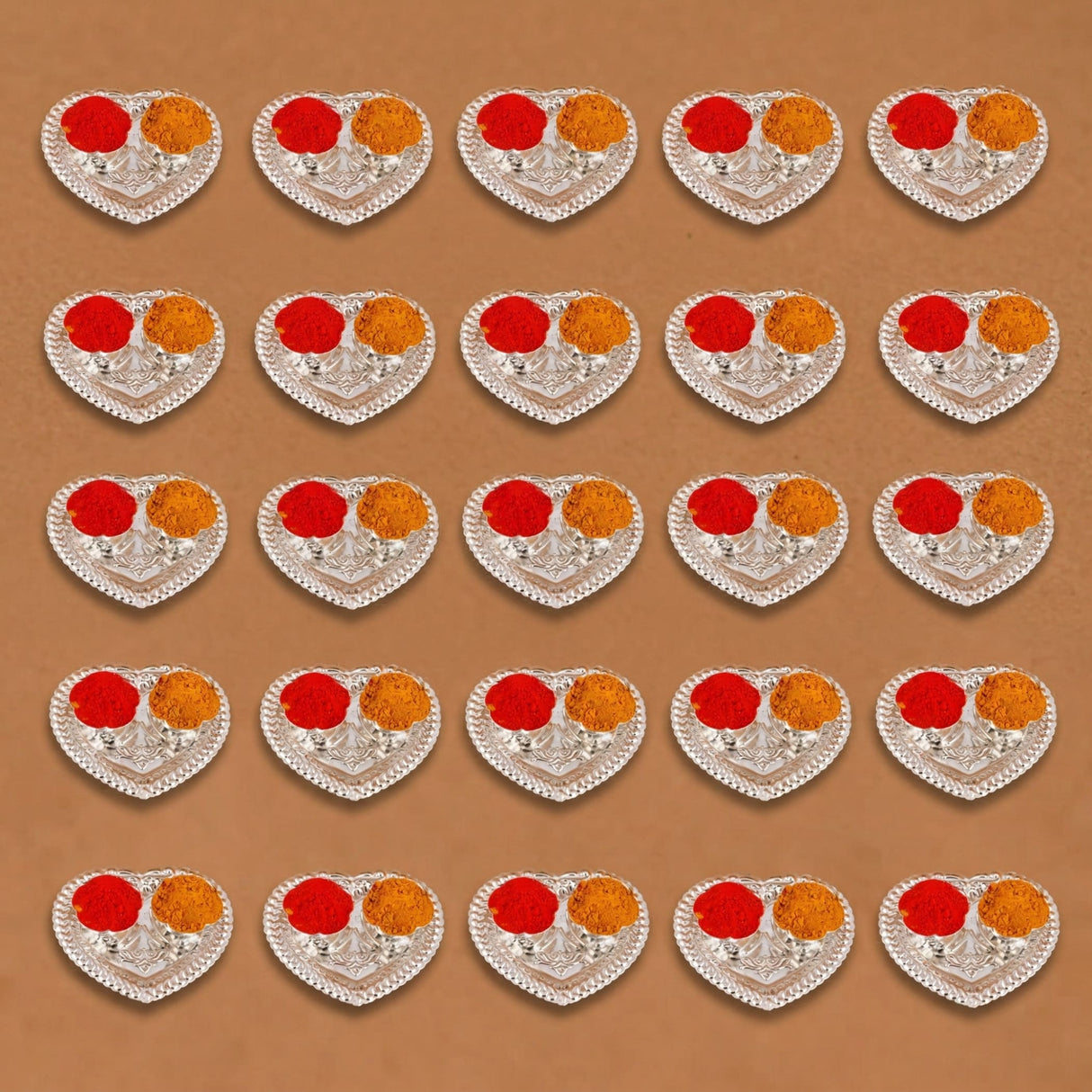 Silver plated heart shaped haldi kumkum holder with red and orange powders for indian festival puja and wedding favors
