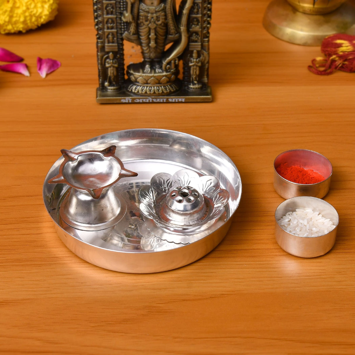 Shiny silver plated 5-piece pooja thali set with star-shaped diya and floral incense burner for Indian rituals