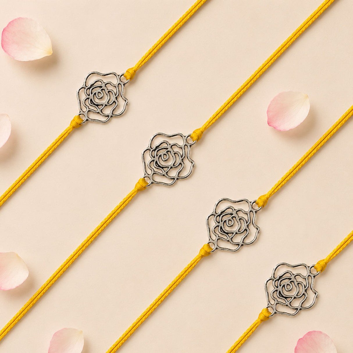Yellow cord rose charm rakhi bracelet featuring a silver toned delicate rose for brother and bhabhi protection gift