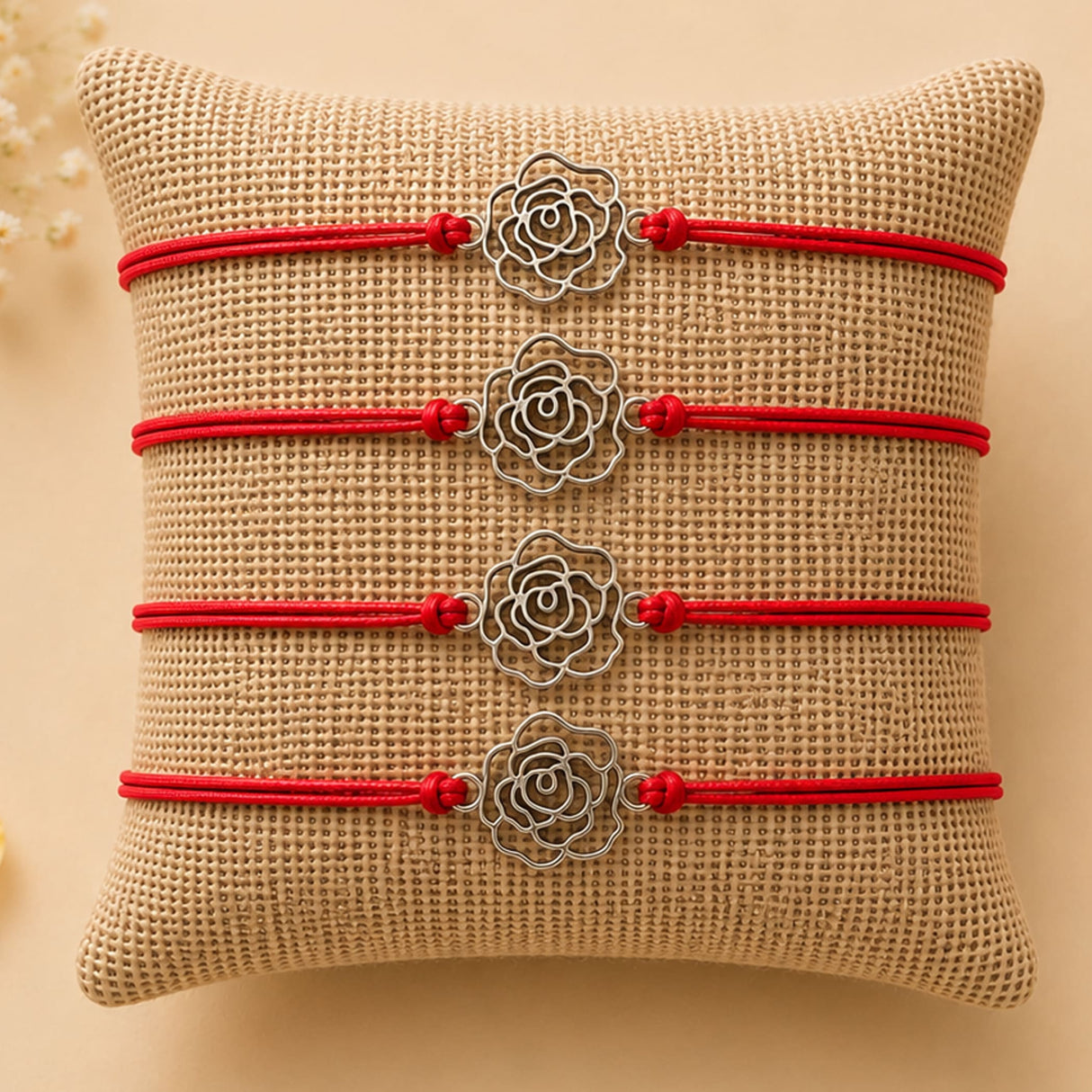 Four red cord rose charm rakhi bracelets with silver toned metal charms traditional handmade protection gift