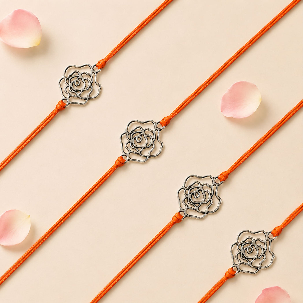Orange cord bracelet with silver rose charm traditional handmade rakhi for brother and bhabhi protection and good luck