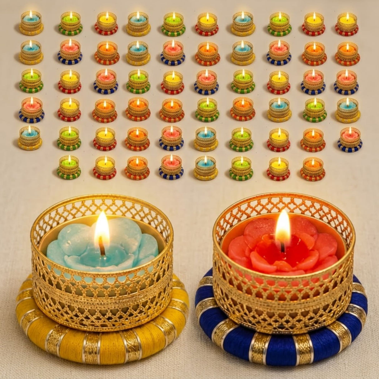 Gold filigree bulk small tealight candle holders with blue and red wax flower-shaped diyas on woven bases for festive decor