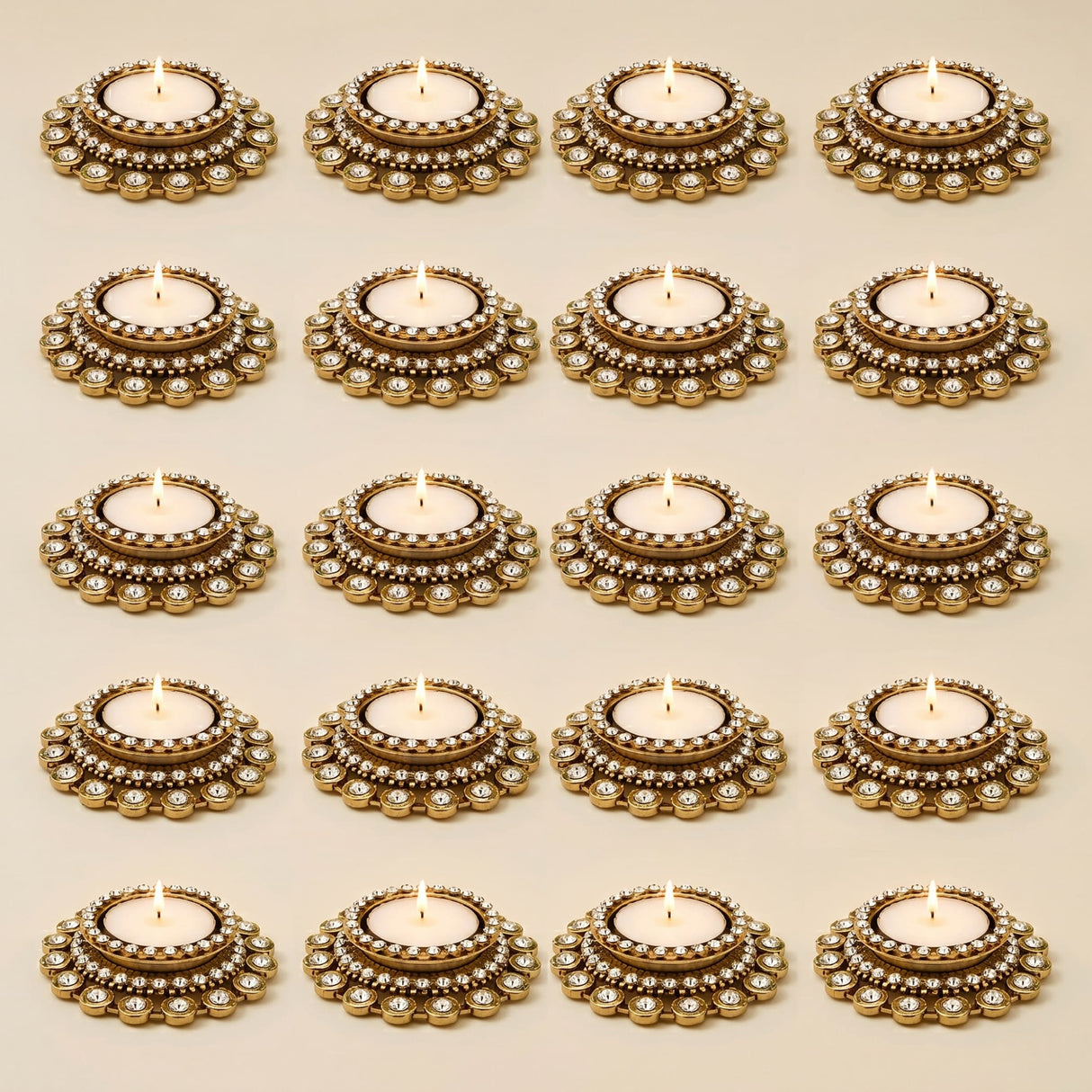Gold-colored ornate tea light candle holders with intricate beaded detailing for traditional diya stand and festive home decor