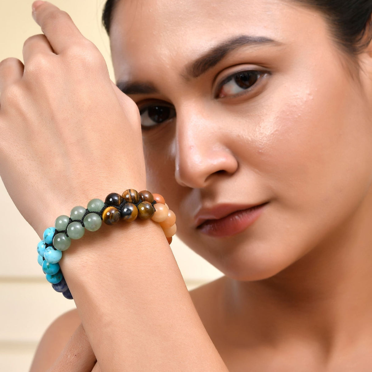 Colorful beaded chakra bracelet with tiger’s eye stones for meditation and healing