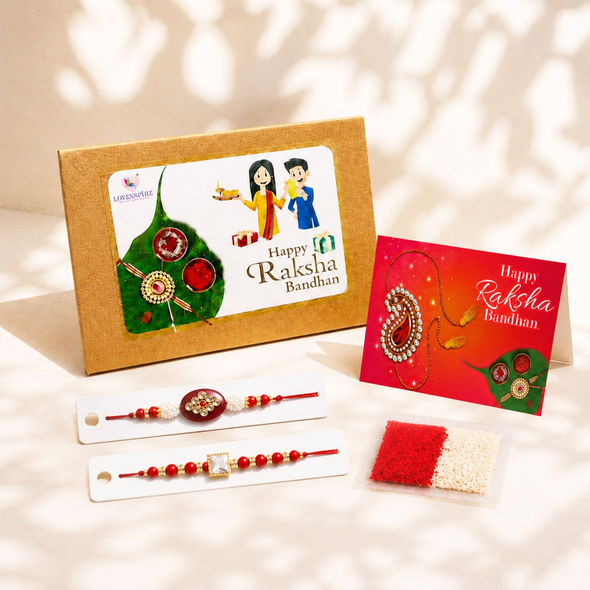 Traditional lumba rakhi set featuring red and gold embellished rakhi with central decorative pendant for raksha bandhan gift