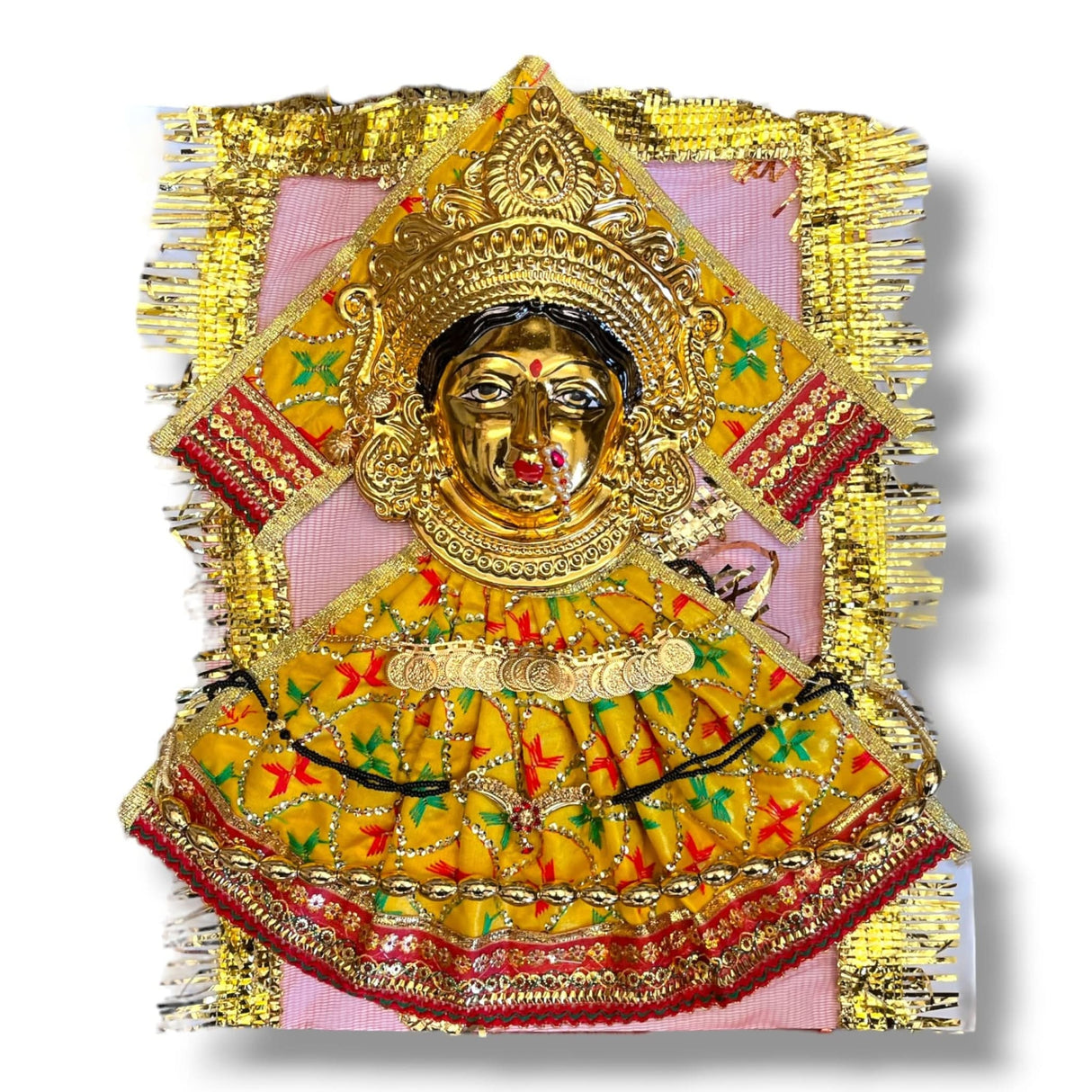 Ornate golden Hindu goddess face figure for Vara Lakshmi Vratam Navaratri puja