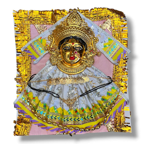 Golden Hindu deity figure of Vara Lakshmi Goddess with dress and jewelry for religious worship