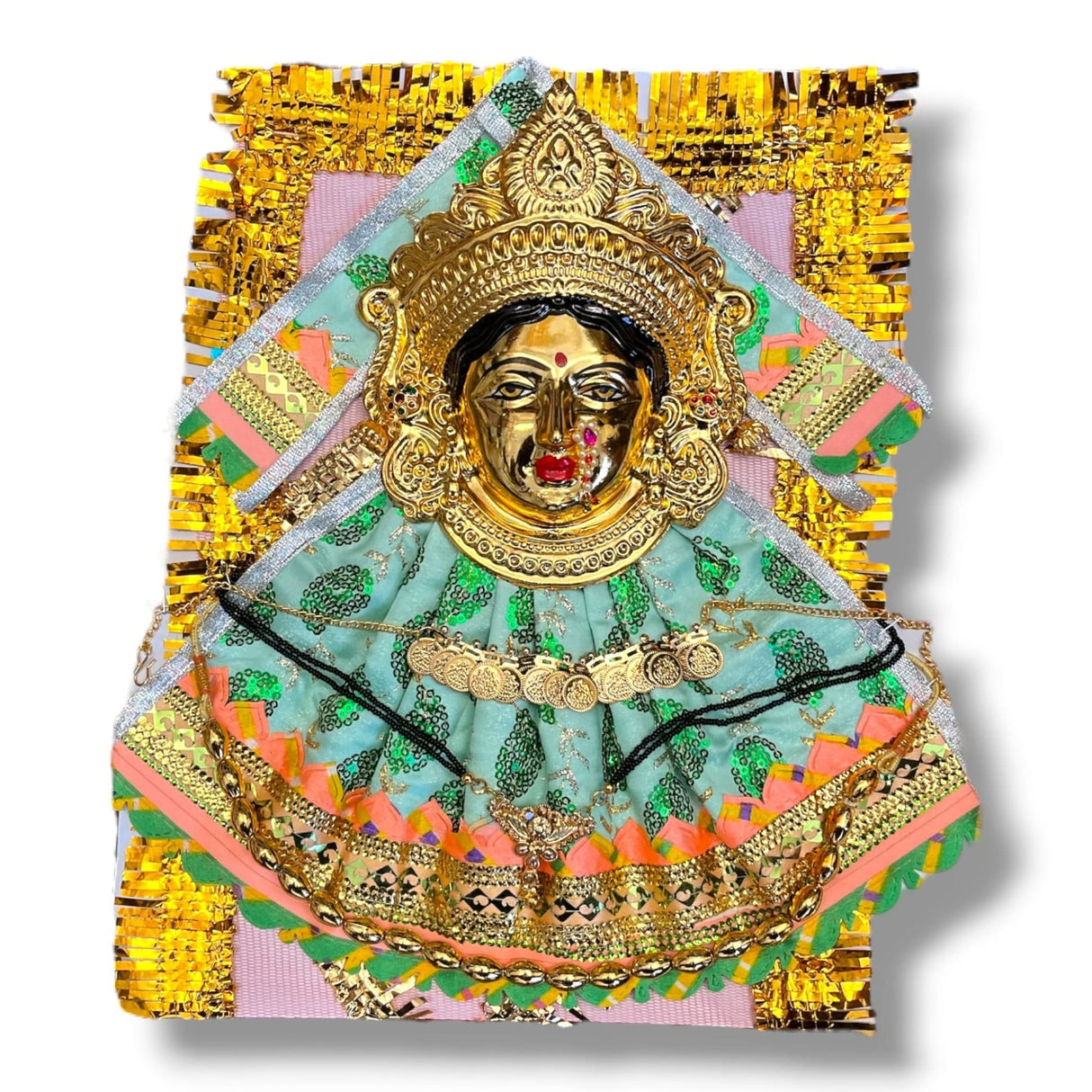 Golden Hindu deity statue with ornate clothing and intricate jewelry for religious puja