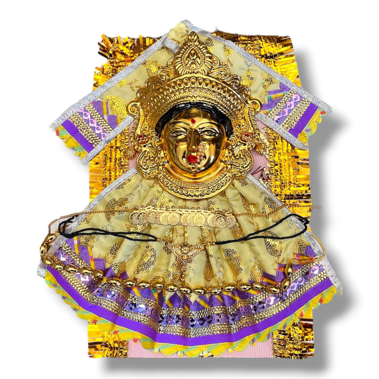 Golden Hindu deity statue adorned with ornate clothing and jewelry for religious rituals