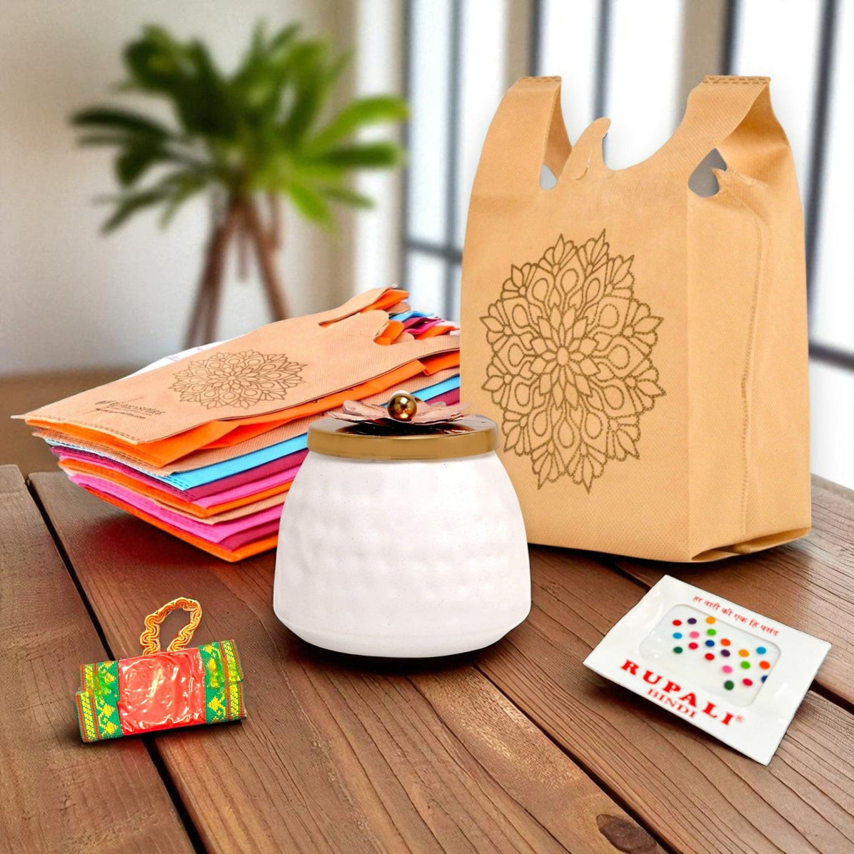 White ceramic jar with gold trim from Varalakshmi Vratham Gift Hamper for Hindu celebrations