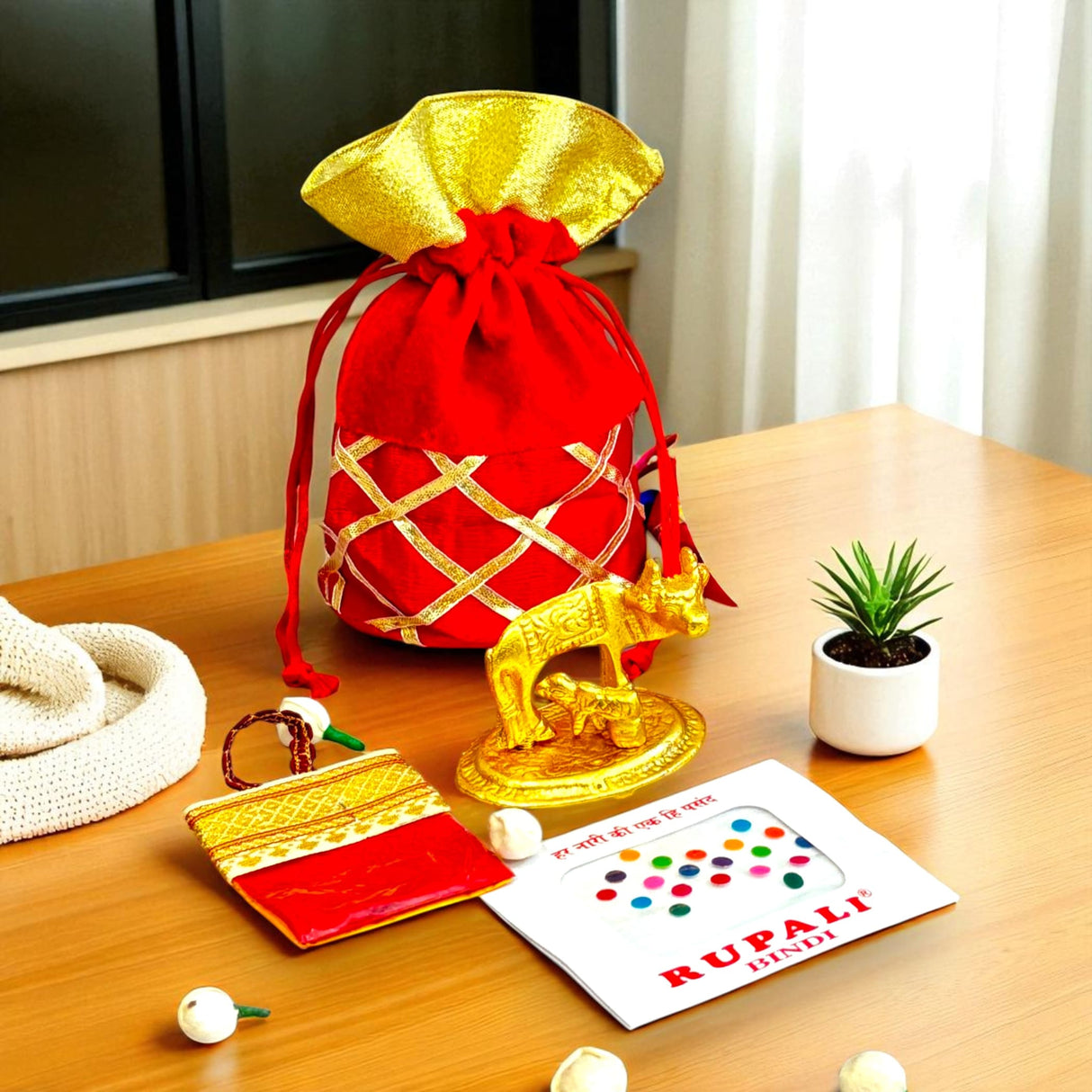 Red and gold gift bag with contents for Varalakshmi Vratham Navaratri puja rituals
