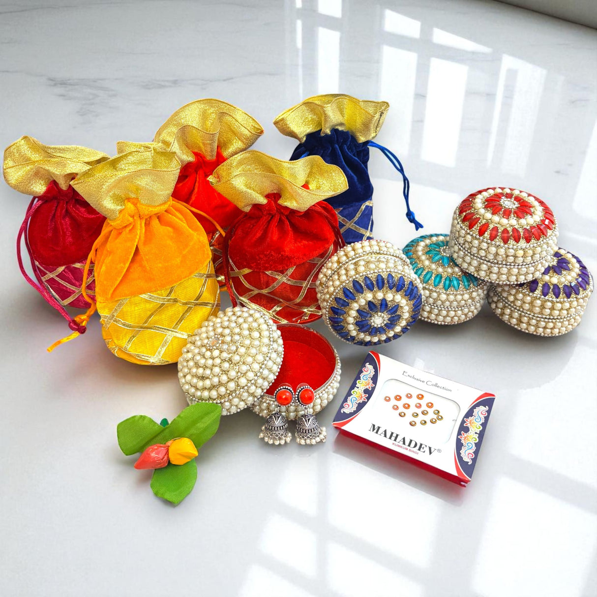 Colorful pouches and decorative boxes for Varalakshmi Vratham Navaratri gift hampers
