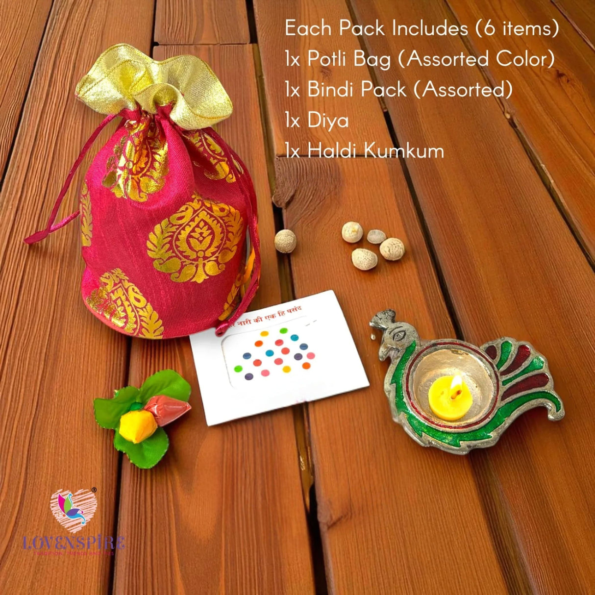Vibrant red potli bag with golden paisley embroidery and gold drawstring for Varalakshmi Vratham and festive gift hampers
