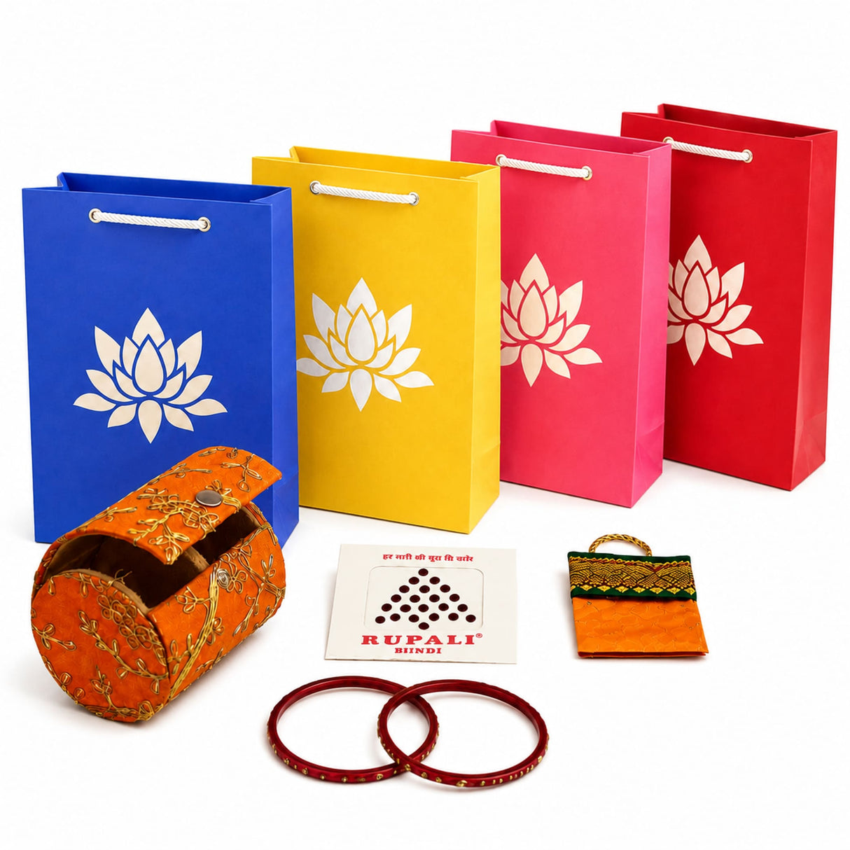 Orange embroidered cylindrical bangle box with gold thread detailing and silver clasp in varalakshmi vratham gift hamper
