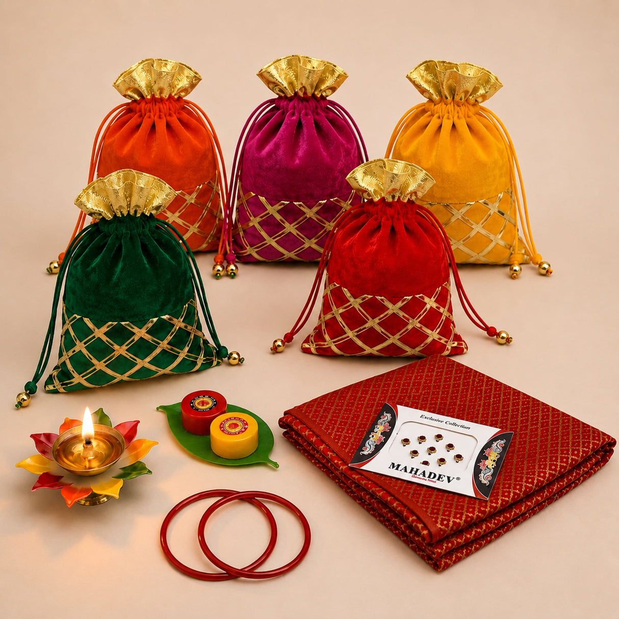 Vibrant velvet potli bags in orange magenta yellow green and red with gold lattice pattern and drawstrings for religious gift hampers
