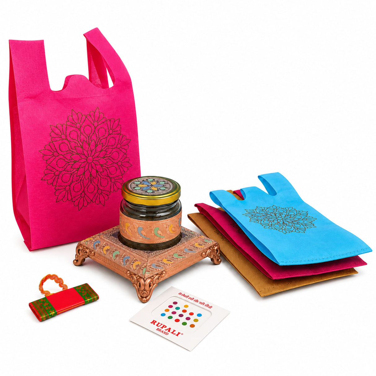 Vibrant pink non-woven fabric tote bag with black mandala design in varalakshmi vratham gift hamper for pooja and navratri