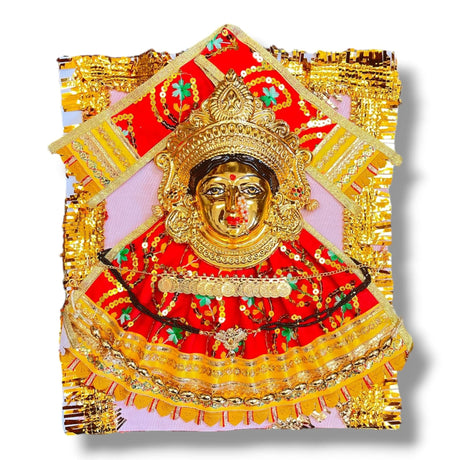 Ornate golden Hindu deity statue with embroidery dress and jewelry for Navaratri Pooja