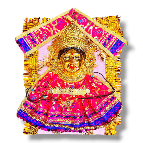 Golden Hindu deity statue with pink and blue embroidered clothing for Navaratri Pooja
