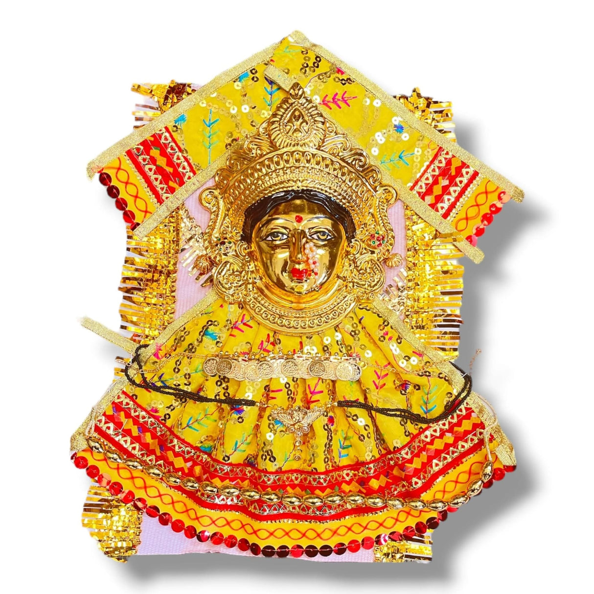 Golden Hindu deity statue with yellow and red embroidered clothing for Navaratri worship