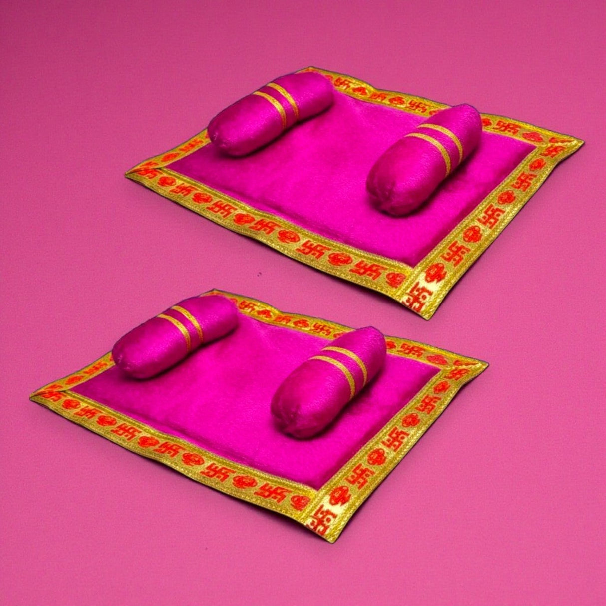 Pack of 2 vibrant fuchsia satin prayer mats with gold borders for Laddu Gopal