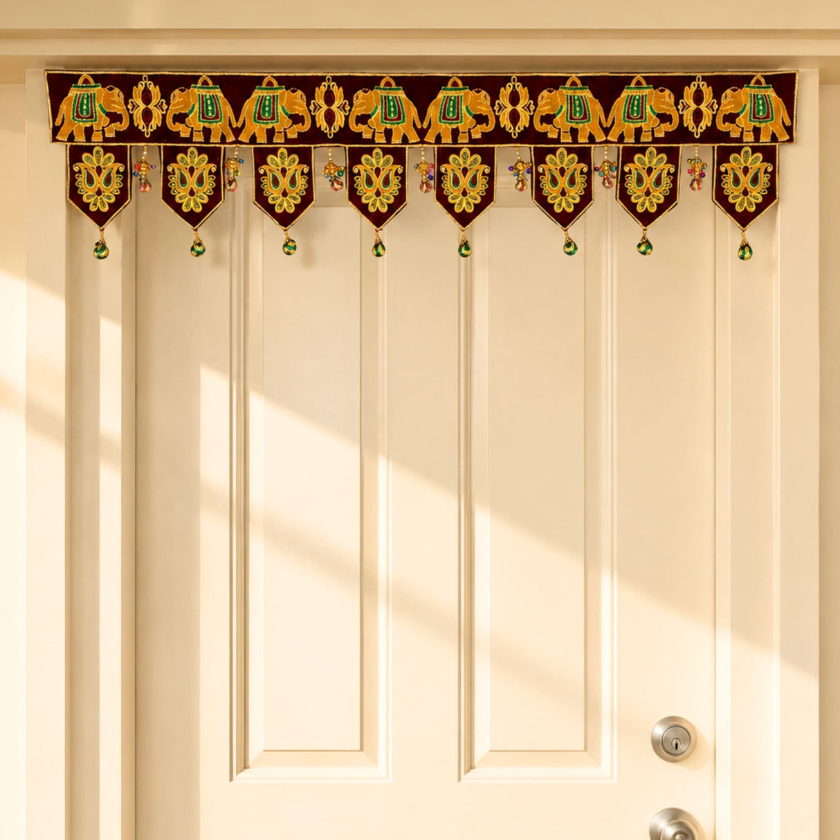 Elephant velvet fabric door toran with maroon gold embroidery and green beaded tassels for traditional home decor