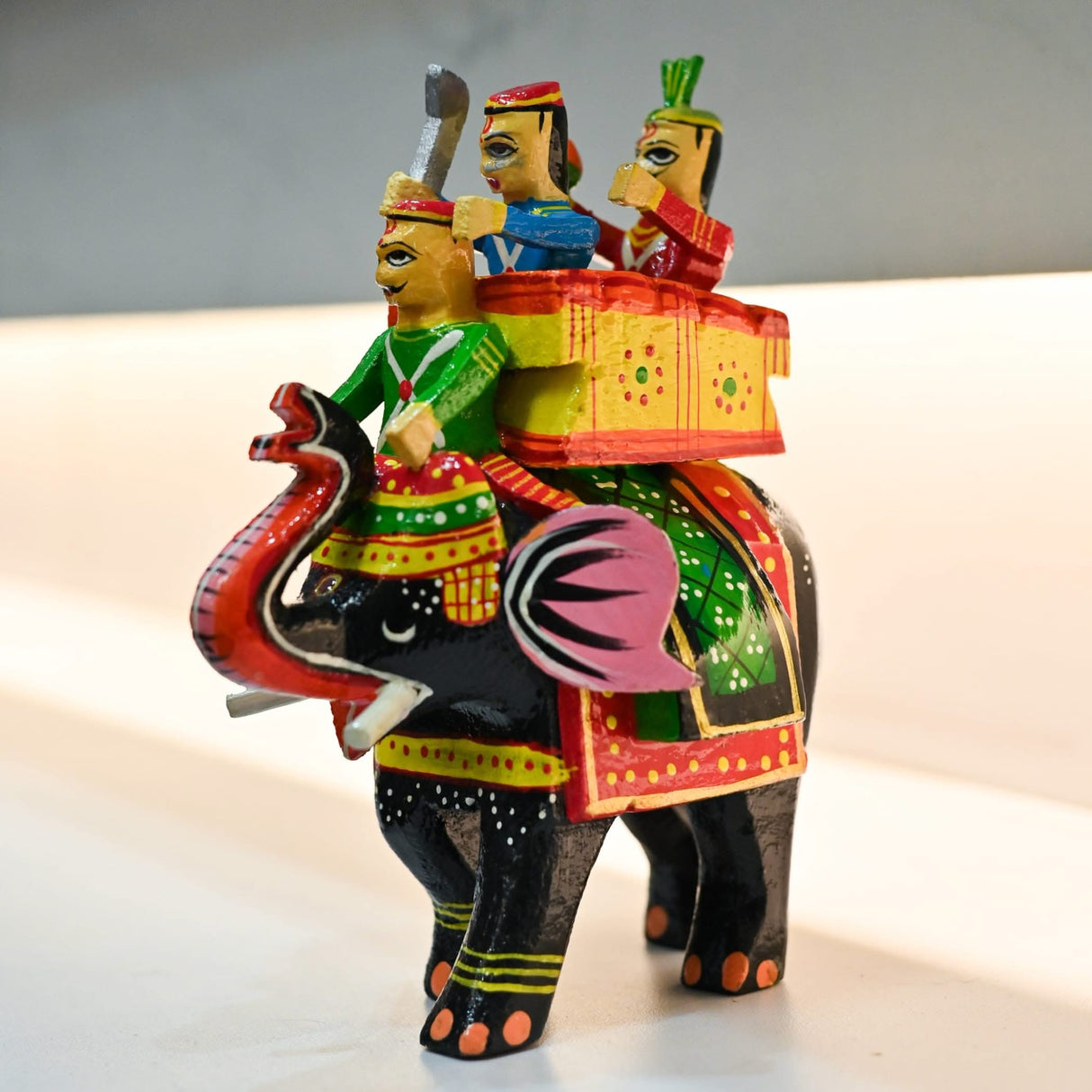 Colorful wooden Maharaja Amrapali elephant figurine with riders for home decor display