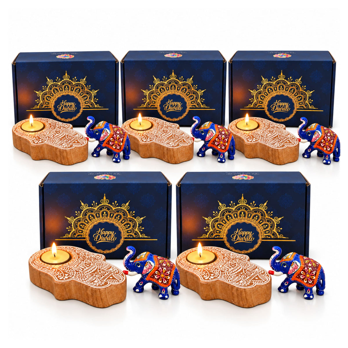Blue and orange decorative elephant figurines with intricate patterns in a diwali gift hamper with wooden tea light holder