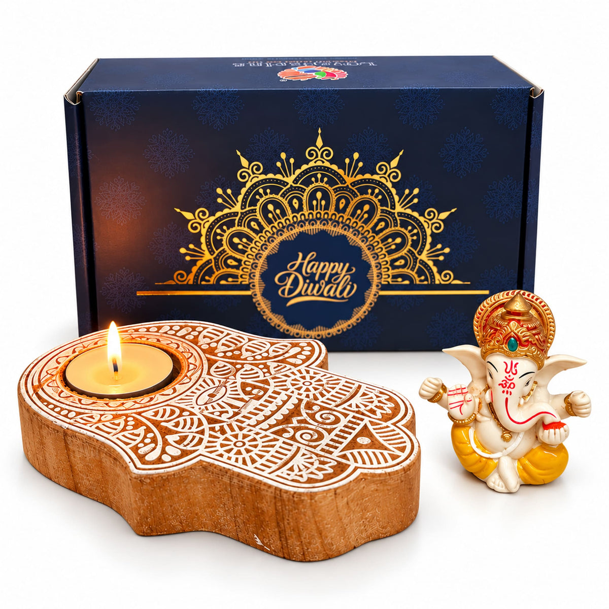 Wooden hand-shaped diya with intricate white carvings and lit candle in Diwali gift hamper for festive celebrations