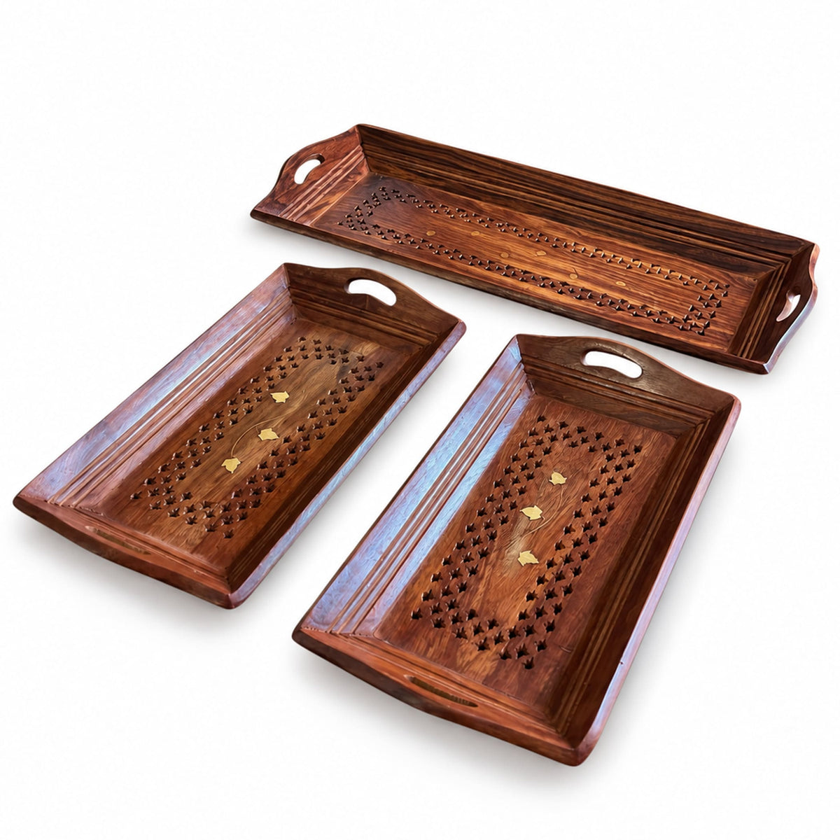 Set of three hand-painted rectangular wooden serving trays with carved patterns and gold inlay for snacks and tea