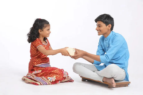 Children exchanging a gift during Bhai Dooj, symbolizing sibling love and rituals