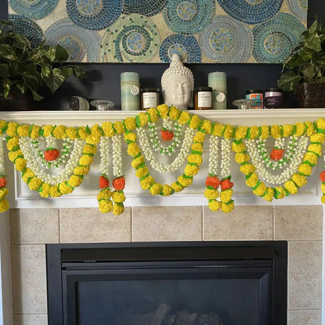 Colorful floral garland featuring yellow, white, and orange blooms for Indian housewarming decorations