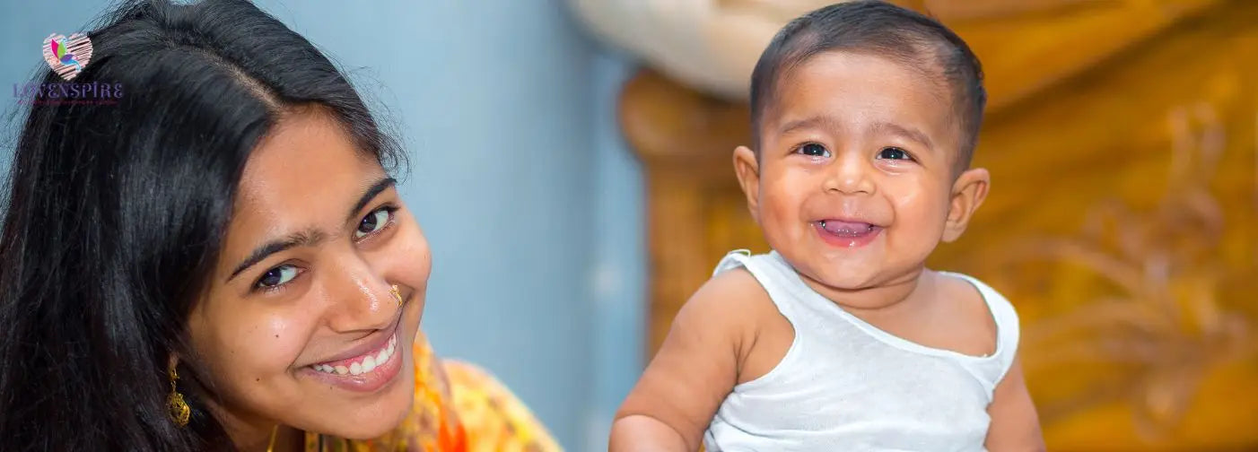 A joyful baby sits on a bed, beaming with a bright smile, radiating happiness and innocence.