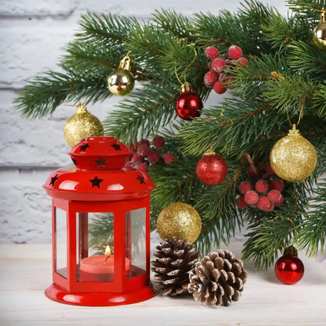 Red lantern with star cutouts in Indian-style Christmas fusion décor