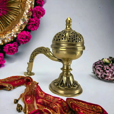 Ornate Brass Incense stick burner that you can get from LoveNspire.