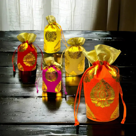 Colorful Indian ethnic drawstring pouches with gold designs for corporate gifting