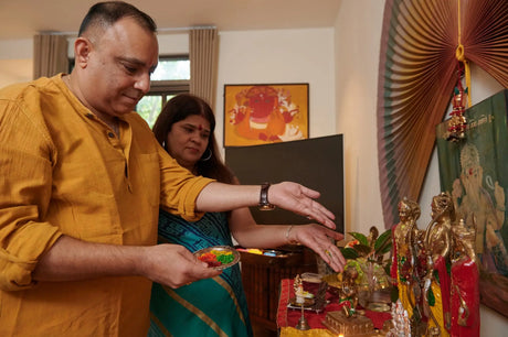 A vibrant Dhanteras celebration scene featuring a diverse family of Hispanic and Caucasian members joyfully decorating their home. They are hanging strings of b