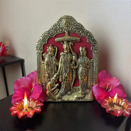 Decorative golden idol of Lord Rama, Sita, Lakshmana, and Hanuman with fairy lights for diy diwali decoration