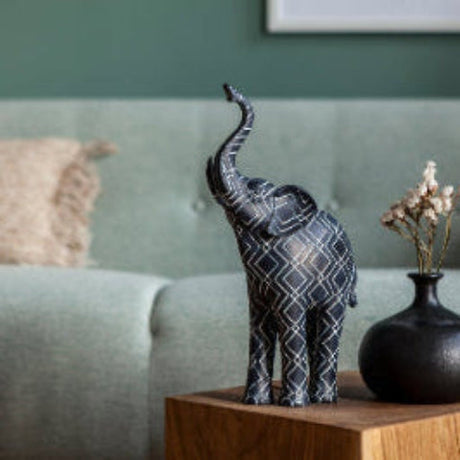 Keeping the Ganesh elephant figurine as a decorative object in the living room or any designated space in the home that comes into everybody’s notice symbolizes wisdom, strength, and good luck.