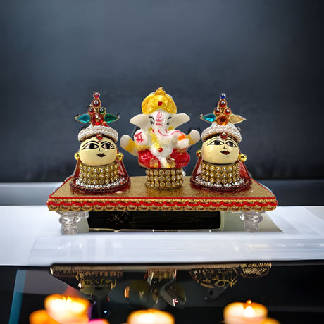 A serene elephant-headed deity sits peacefully at the center of the image, surrounded by gold coins and bountiful fruits, symbolizing prosperity. Two vibrant, e