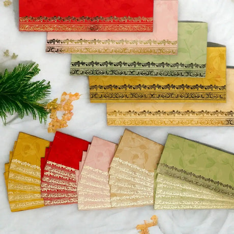 Colorful fabric samples arranged in a fan pattern suitable for wedding, Eid, or Christmas money envelopes