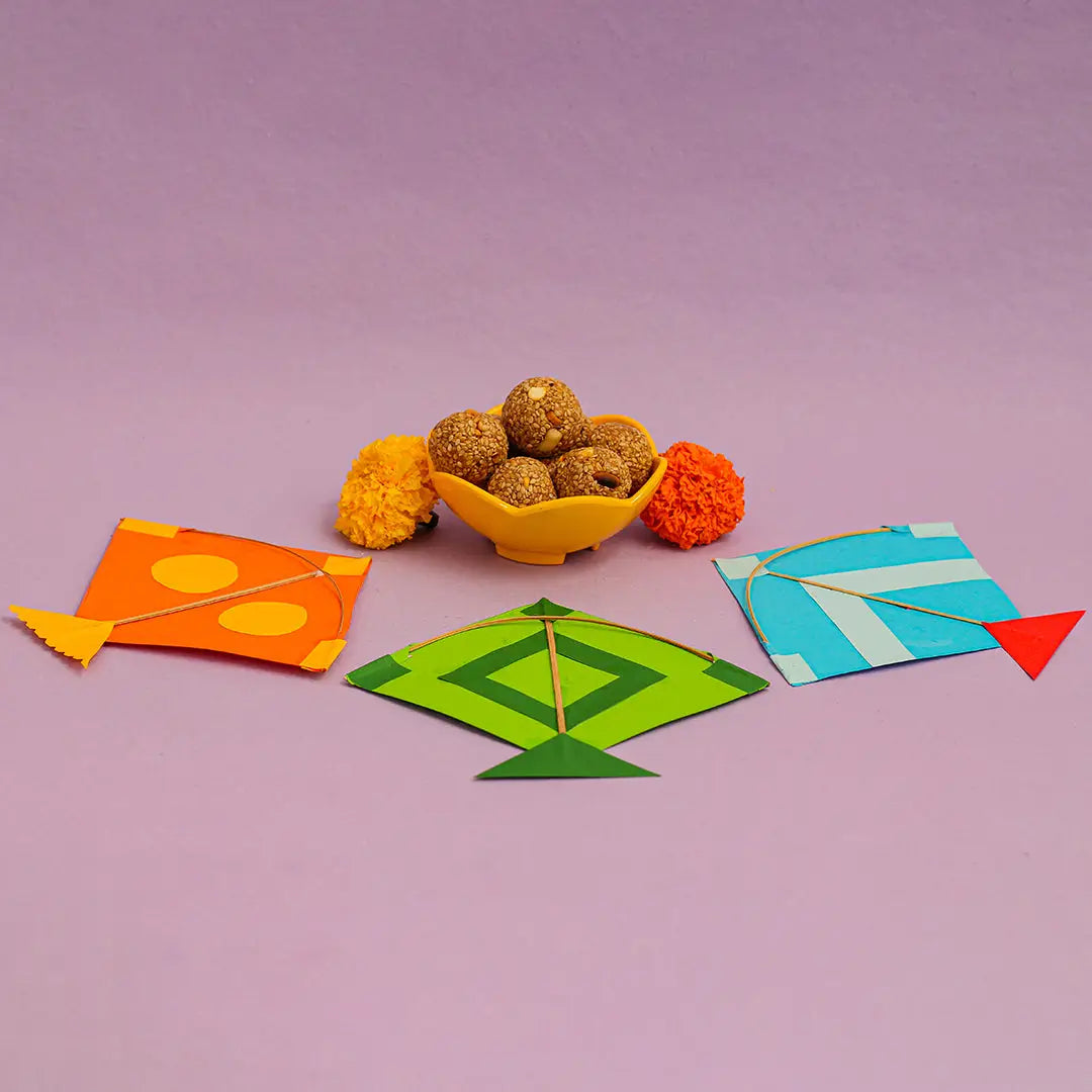 A bowl of tilgud beside a colorful kites, set against a vibrant purple background.