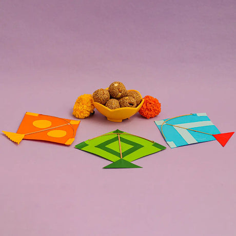 A bowl of tilgud beside a colorful kites, set against a vibrant purple background.