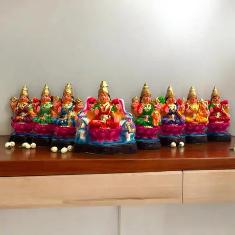 A vibrant Navratri Golu display featuring multi-tiered arrangements of intricately crafted traditional clay dolls depicting various Hindu deities and scenes.
