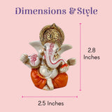 White orange resin Ganesha figurine with gold details for car dashboard